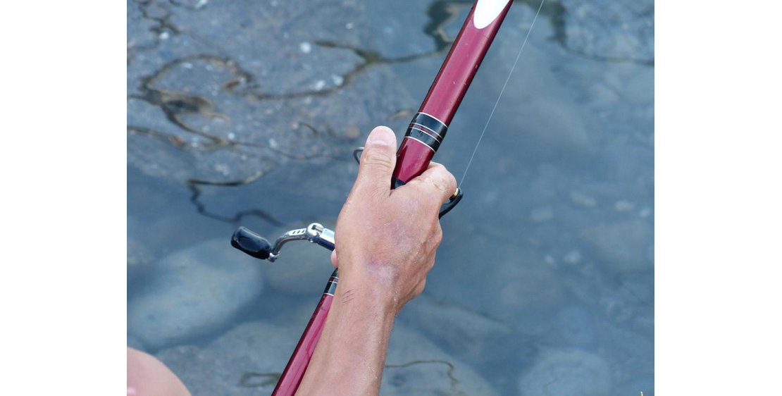 Photo Super U - "Vente de permis de pêche"